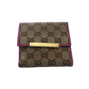 Gucci GG canvas compact wallet with pink leather trim